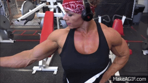 Woman In Headphones And Bandana At Gym GIF