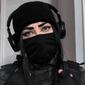 Woman In Headphones And Black Mask GIF