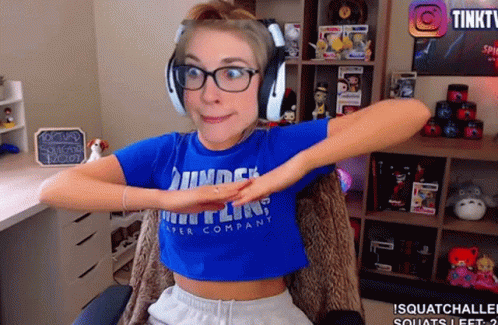 Woman in Headphones and Blue Shirt Company