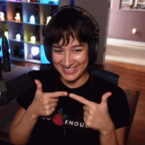 Woman in Headphones and God Enough T-Shirt