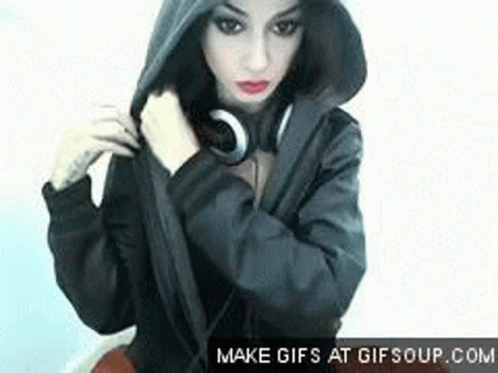 Woman In Headphones And Hooded Jacket Making GIF