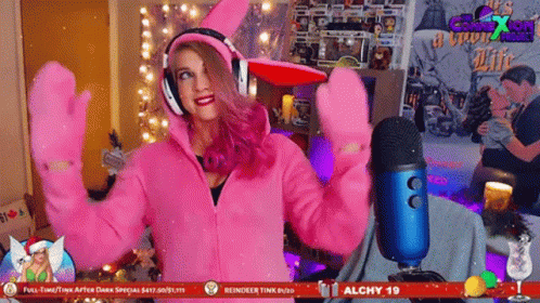 Woman In Headphones And Pink Gloves At Alchy 19 Sign GIF