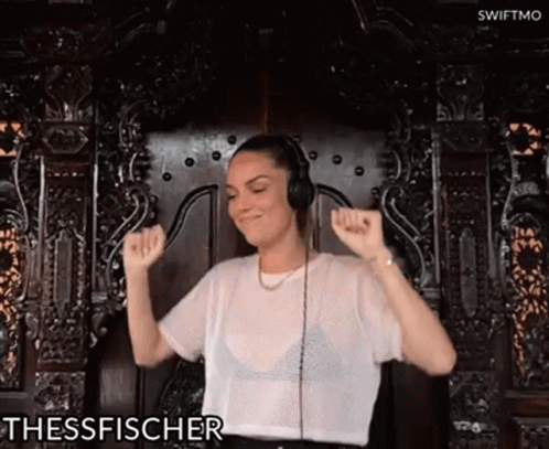 Woman in Headphones Dancing Thessfischer