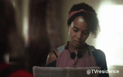 Woman In Headphones Looking At Tvresidence Paper GIF