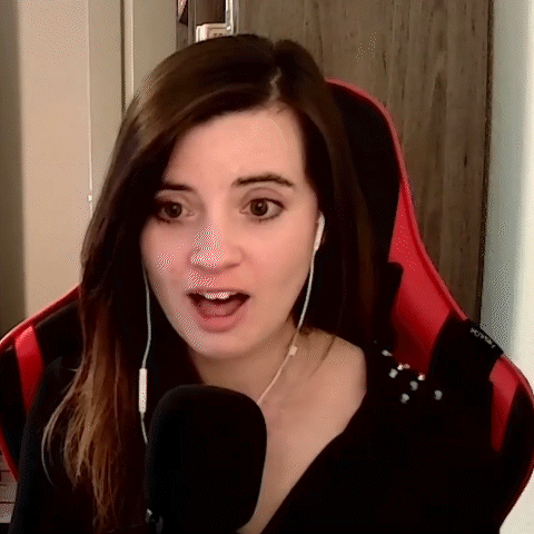 Woman In Headphones Talking Into Microphone In Red Chair GIF
