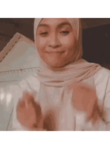 Woman in Hijab Making Heart