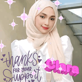 Woman in Hijab Standing in Front of Thanks for Your Support Sign