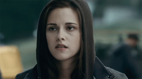 Woman in Hooded Jacket Looking at Camera