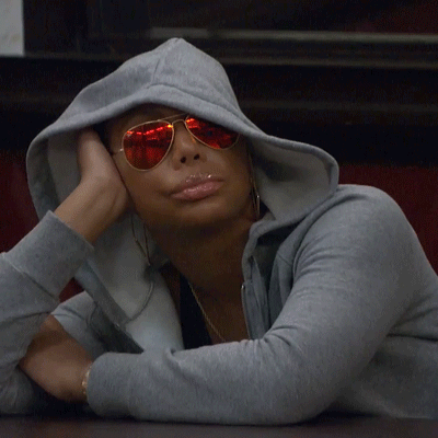 Woman in Hoodie and Red Sunglasses