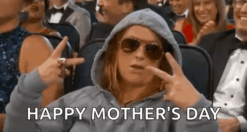 Woman in Hoodie and Sunglasses Making Peace Sign