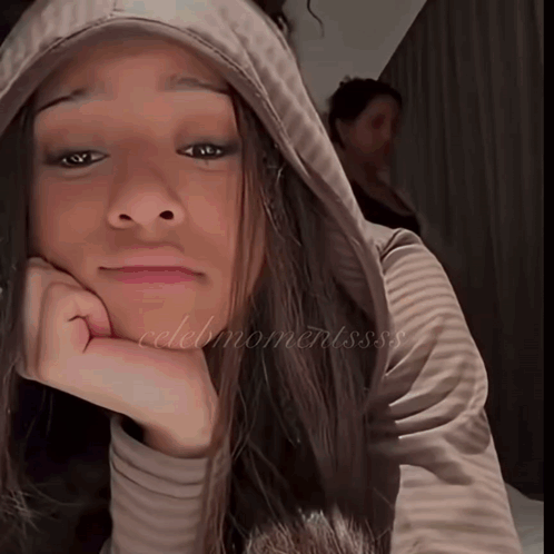 Woman in Hoodie with CelebMomentsss