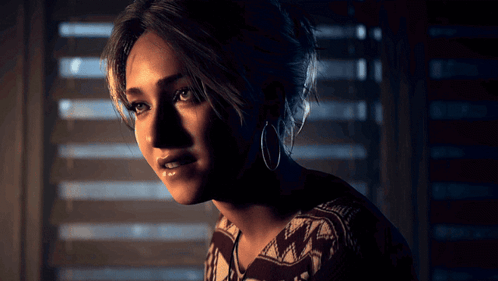 Woman In Hoop Earrings And Sweater By Window GIF