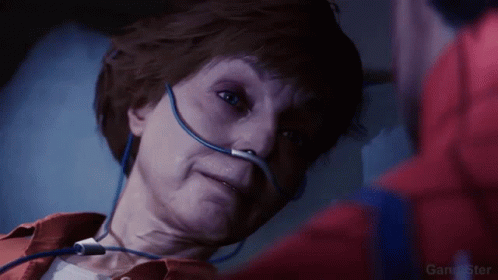 Woman in Hospital Bed With Oxygen Mask