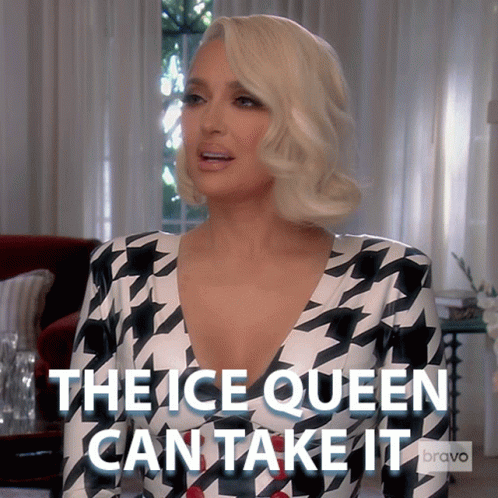 Woman In Houndstooth Dress Says The Ice Queen Can Take It GIF