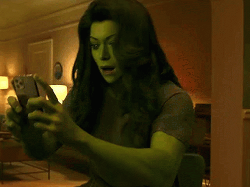 Woman in Hulk Costume Taking Selfie