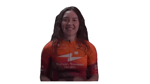 Woman in Human Powered Health Shirt Arms Up