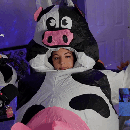 Woman In Inflatable Cow Costume Day GIF
