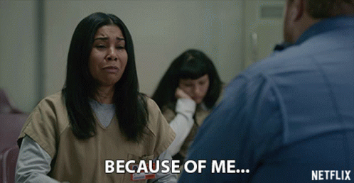 Woman in Jail Cell Saying Because of Me