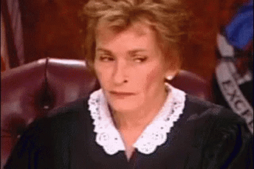 Woman in Judge's Robe Making Funny Face
