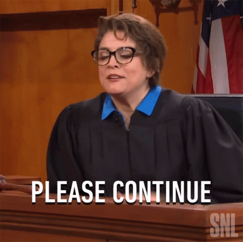 Woman in Judge's Robe Saying Please Continue