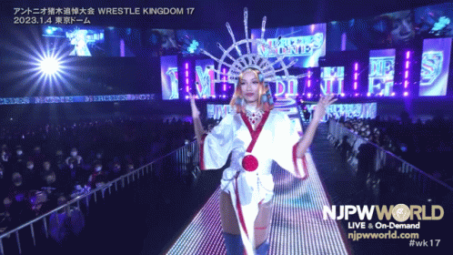 Woman in Kimono Walking Down Stage With NJPWWorld