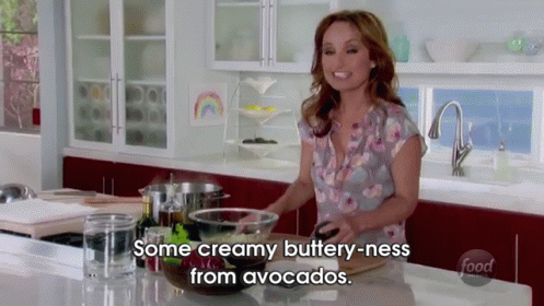 Woman in Kitchen Saying Creamy Buttery-ness From Avocados