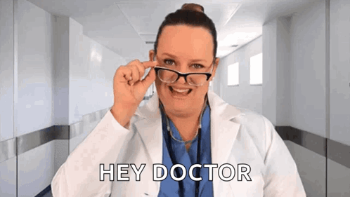 Woman in Lab Coat Saying Hey Doctor