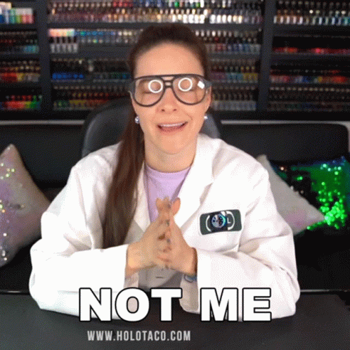 Woman in Lab Coat Saying Not Me