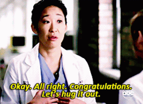 Woman in Lab Coat Says Okay All Right Congratulations Let's Hug It Out