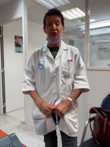Woman in Lab Coat with AI Sticker
