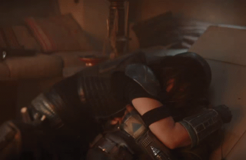 Woman in Leather Hugging Man in Helmet