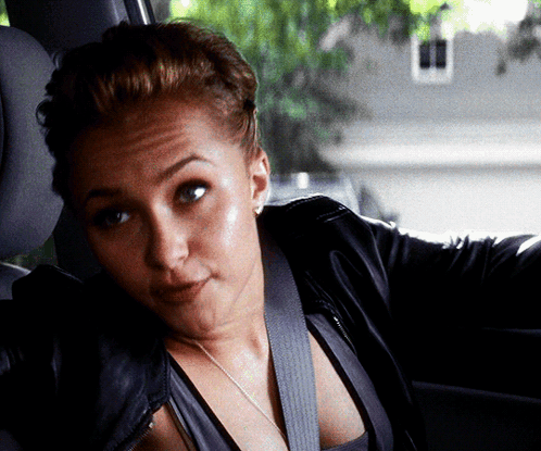 Woman In Leather Jacket And Seat Belt Sitting In Car GIF