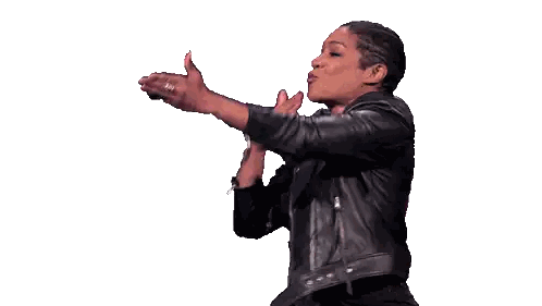 Woman in Leather Jacket Blowing Kiss