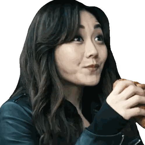 Woman in Leather Jacket Eating Hamburger