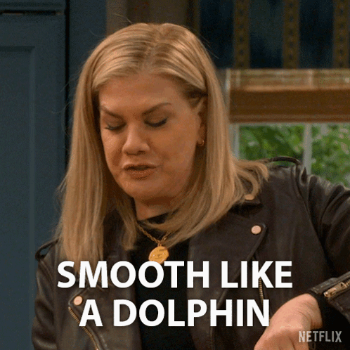 Woman in Leather Jacket Saying Smooth Like a Dolphin
