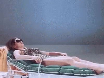 Woman in Leopard Bikini Lying