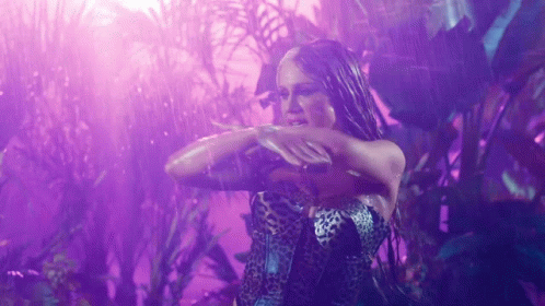Woman In Leopard Dress Dancing In Rain GIF