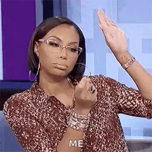 Woman in Leopard Print and Glasses Flipping Off