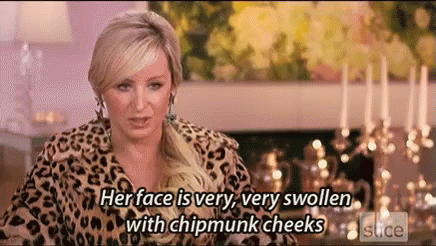 Woman in Leopard Print Jacket with Swollen Chipmunk Cheeks