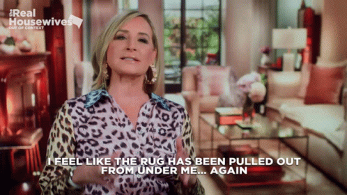 Woman In Leopard Print Shirt I Feel Like The Rug Has Been Pulled Out Again GIF