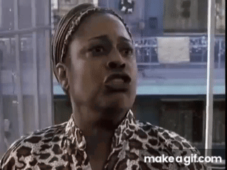 Woman In Leopard Print Shirt Making A Face GIF