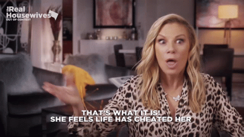 Woman In Leopard Print Shirt Says That GIF