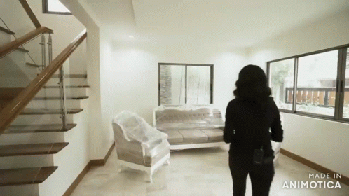 Woman in Living Room With Couch and Chairs Made in Animatica