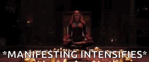 Woman in Lotus Position Surrounded by Candles Manifesting Intensifies