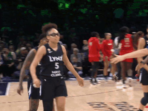Woman In Lynx Jersey On Court GIF