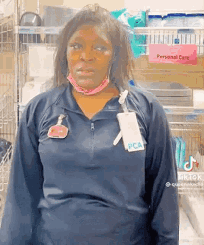 Woman in Mask and PCA Name Tag