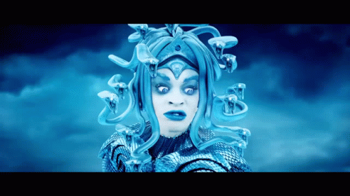 Woman In Medusa Costume With Snake On Head GIF