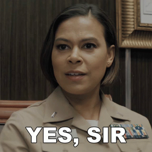 Woman in Military Uniform Saying Yes Sir