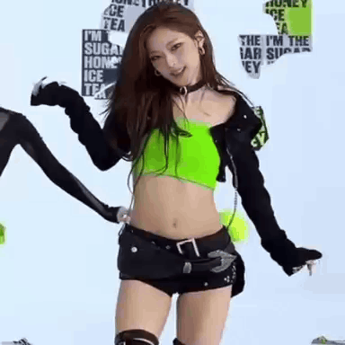 Woman in Neon Green Crop Top Dancing