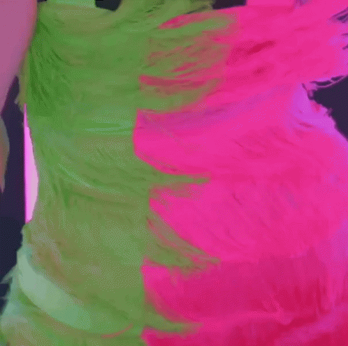 Woman in Neon Pink and Green Dress